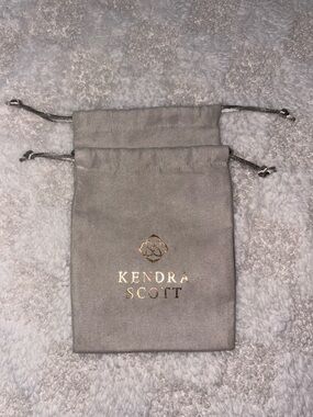 Two Kendra Scott Gray Drawstring Jewelry Pouches with Gold Logo • 5.5” x 4.25”